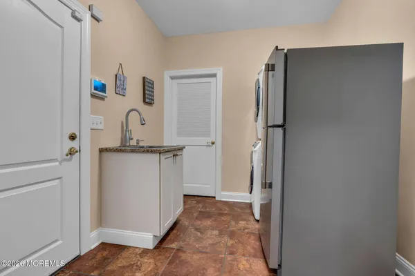 a view of balcony with furniture