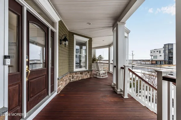 a bedroom with a bed a window and closet