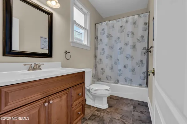 a view of outdoor sitting area with furniture