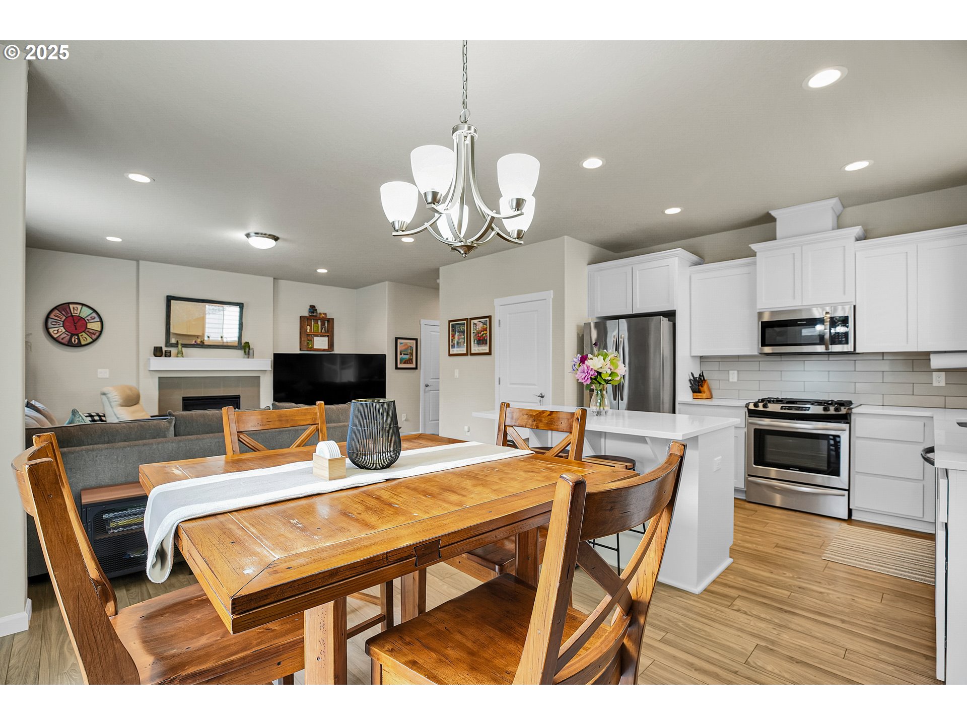 2796 Southeast Baker Avenue Gresham, OR 97080 - Photo 11 of 48 a view of a dining room with furniture and wooden floor