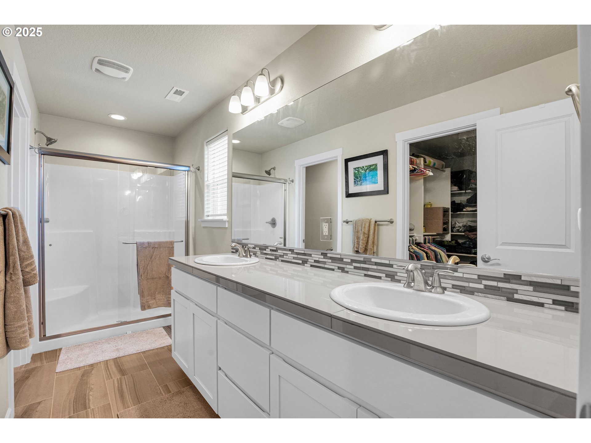 2796 Southeast Baker Avenue Gresham, OR 97080 - Photo 21 of 48 a bathroom with a sink double vanity granite and a mirror