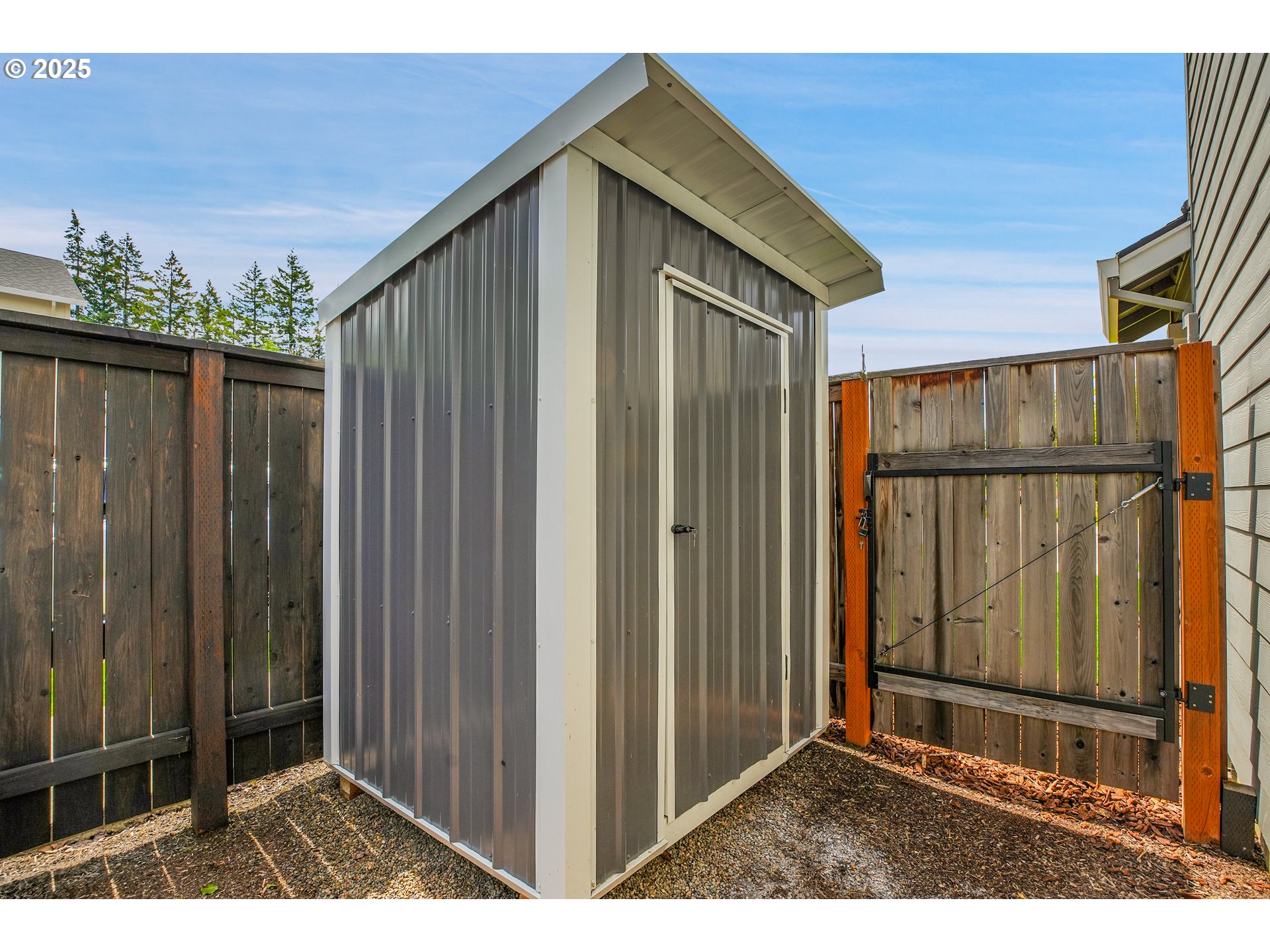 2796 Southeast Baker Avenue Gresham, OR 97080 - Photo 43 of 48 a black and white building with glass windows
