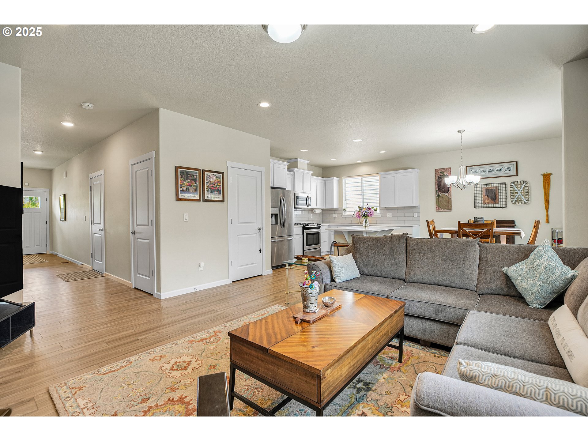 2796 Southeast Baker Avenue Gresham, OR 97080 - Photo 5 of 48 a living room with furniture and a wooden floor