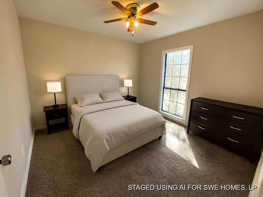 201 Ferguson Drive Cleveland, TX 77327 - Photo 13 of 27 a bedroom with a bed and window