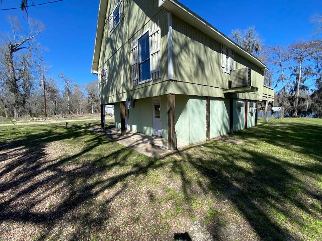 201 Ferguson Drive Cleveland, TX 77327 - Photo 5 of 27 a view of a house with a yard