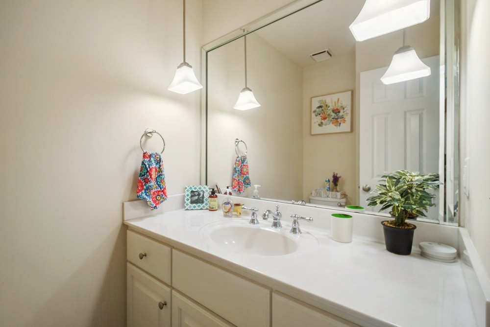 1030 General George Patton Road Nashville, TN 37221 - Photo 21 of 31 a bathroom with a sink and a mirror