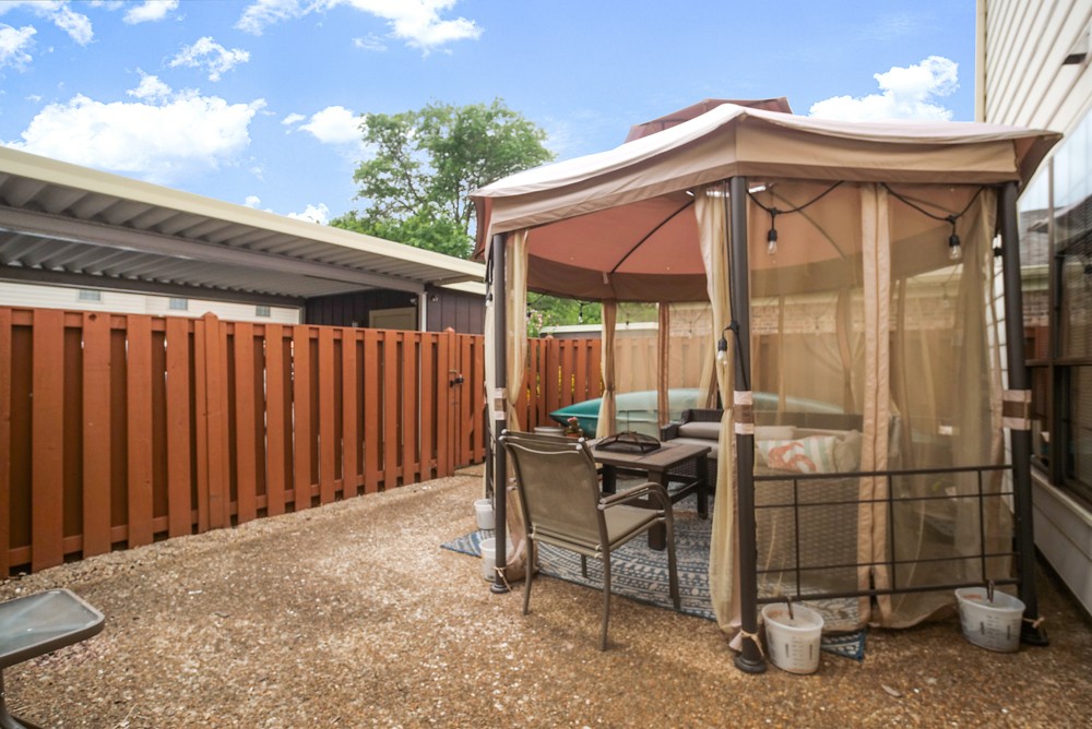 1030 General George Patton Road Nashville, TN 37221 - Photo 29 of 31 a backyard of a house with a yard and outdoor seating