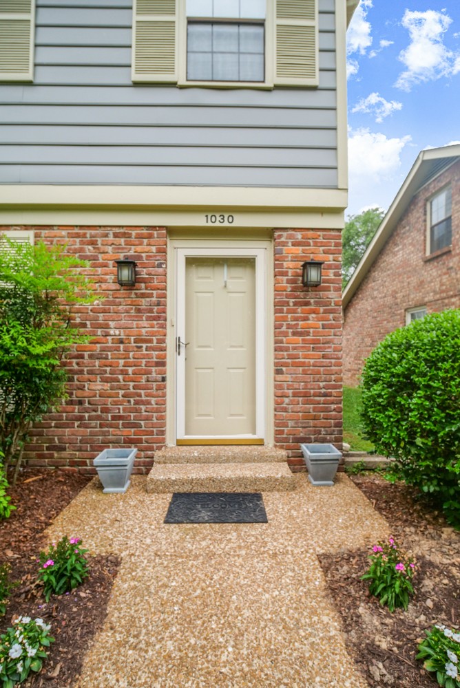 1030 General George Patton Road Nashville, TN 37221 - Photo 4 of 31 a front view of a house with a yard