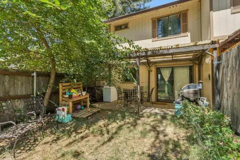 a house view with a outdoor space