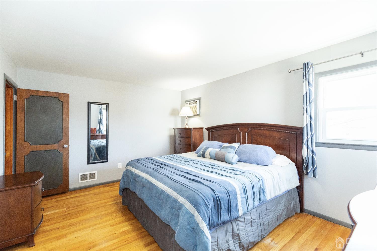28 Melville Road Edison, NJ 08817 - Photo 14 of 52 a bedroom with a bed and window