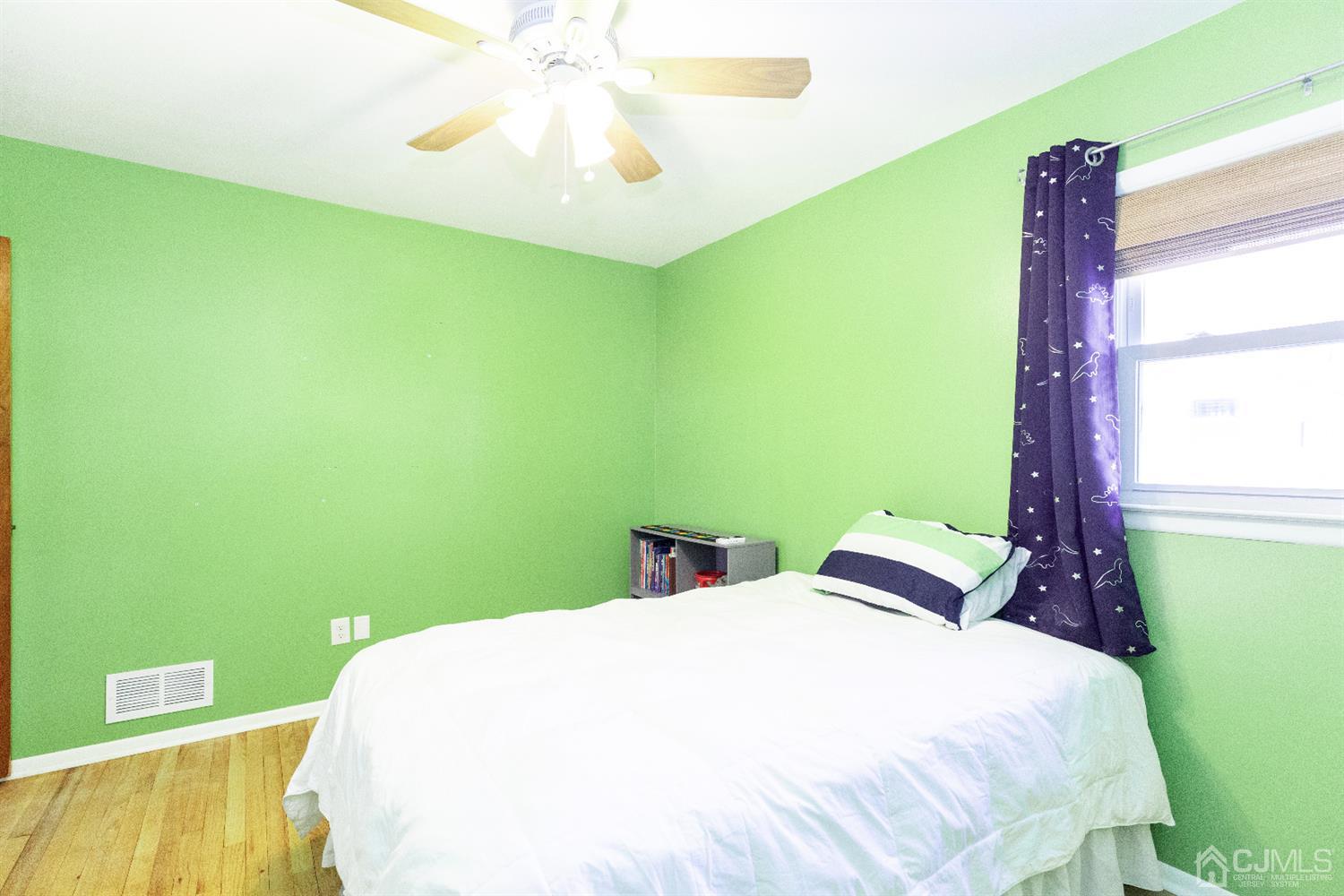 28 Melville Road Edison, NJ 08817 - Photo 22 of 52 a bedroom with a bed and a window