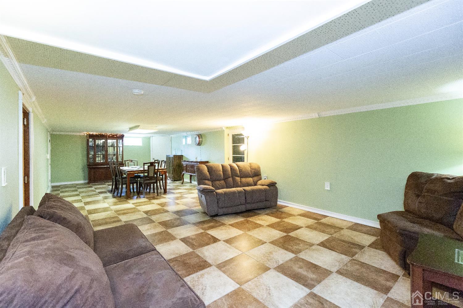 28 Melville Road Edison, NJ 08817 - Photo 25 of 52 a living room with furniture and white walls