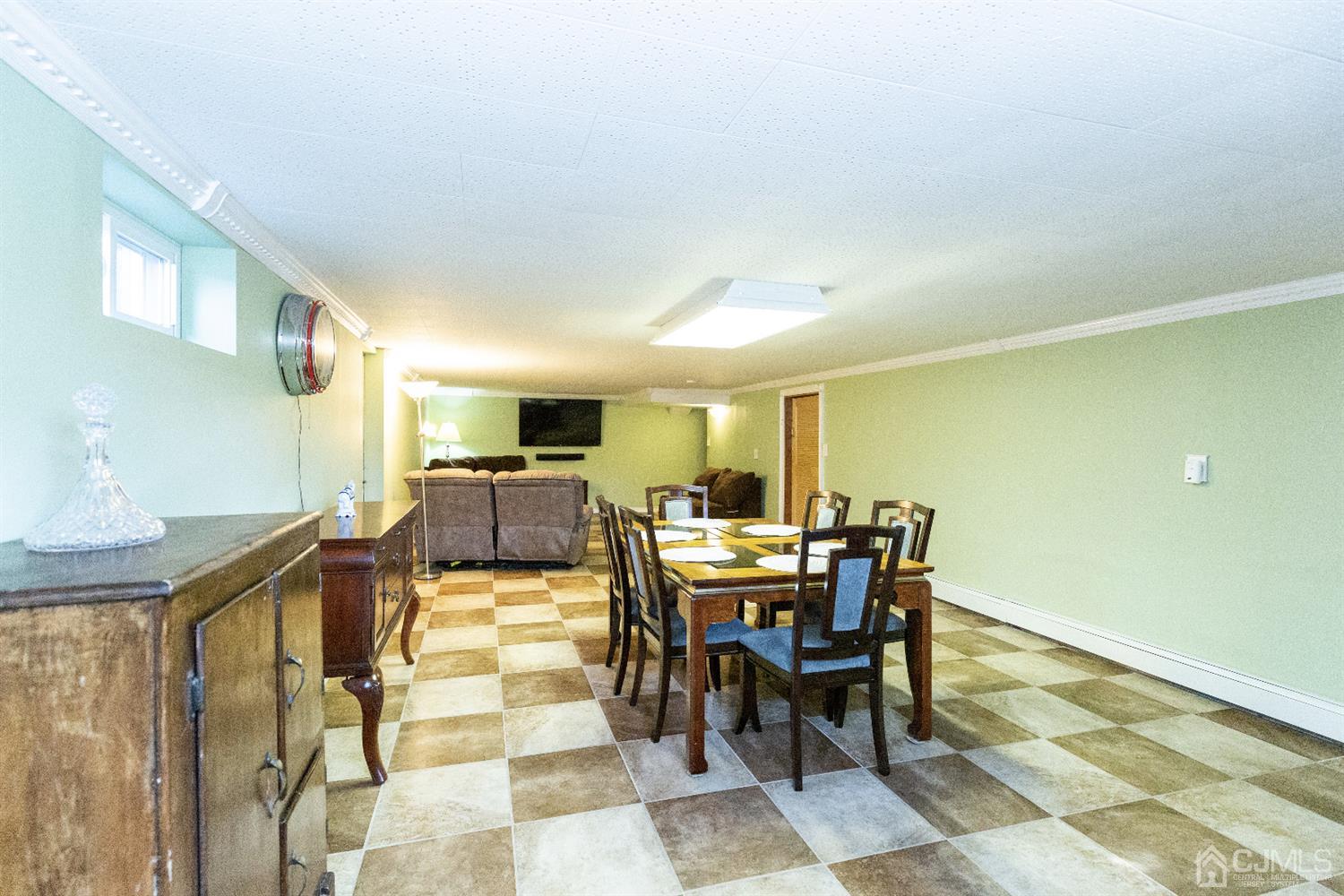 28 Melville Road Edison, NJ 08817 - Photo 27 of 52 a view of a dining area with furniture
