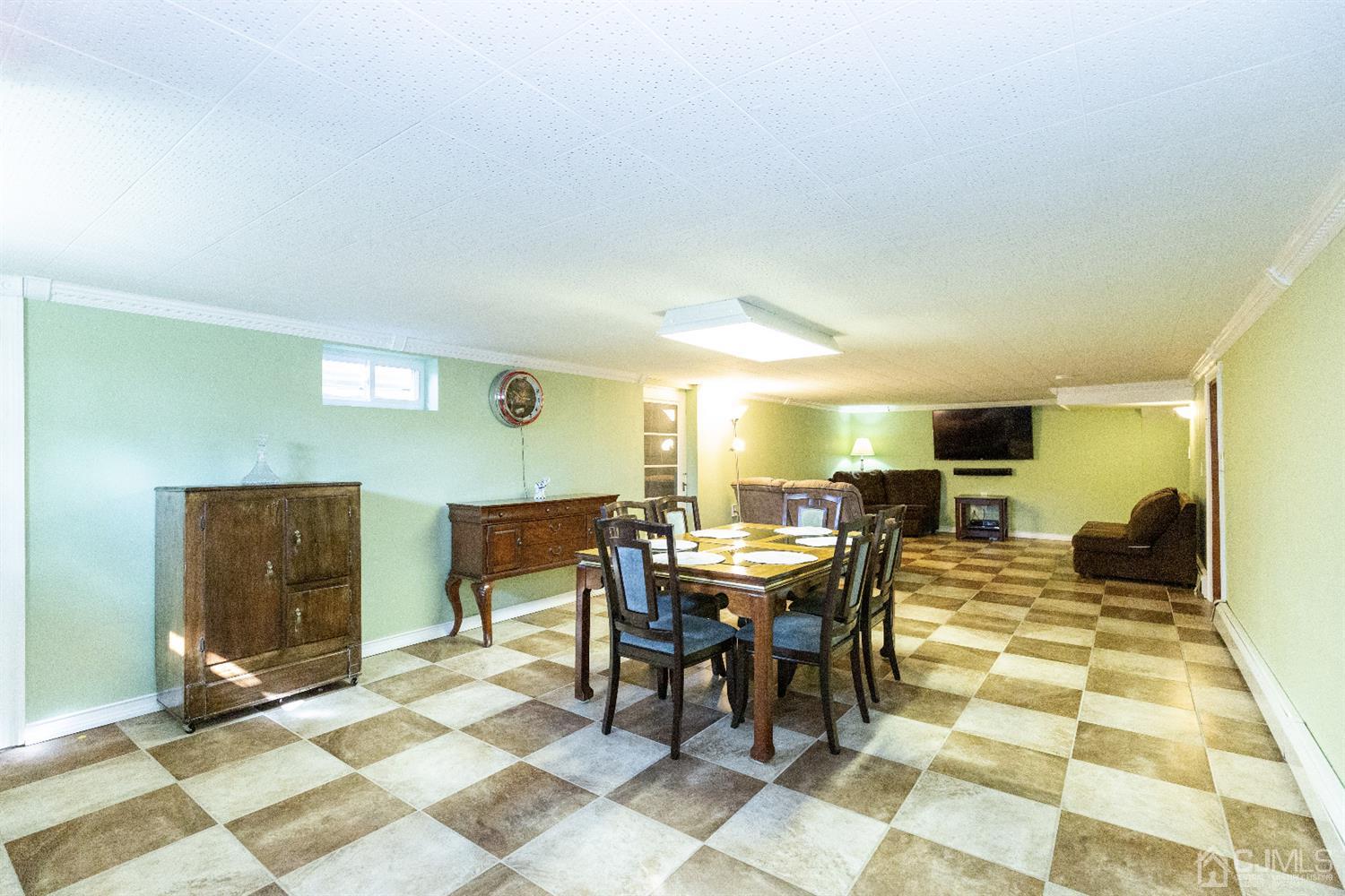 28 Melville Road Edison, NJ 08817 - Photo 28 of 52 a view of a dining room with a table and chairs