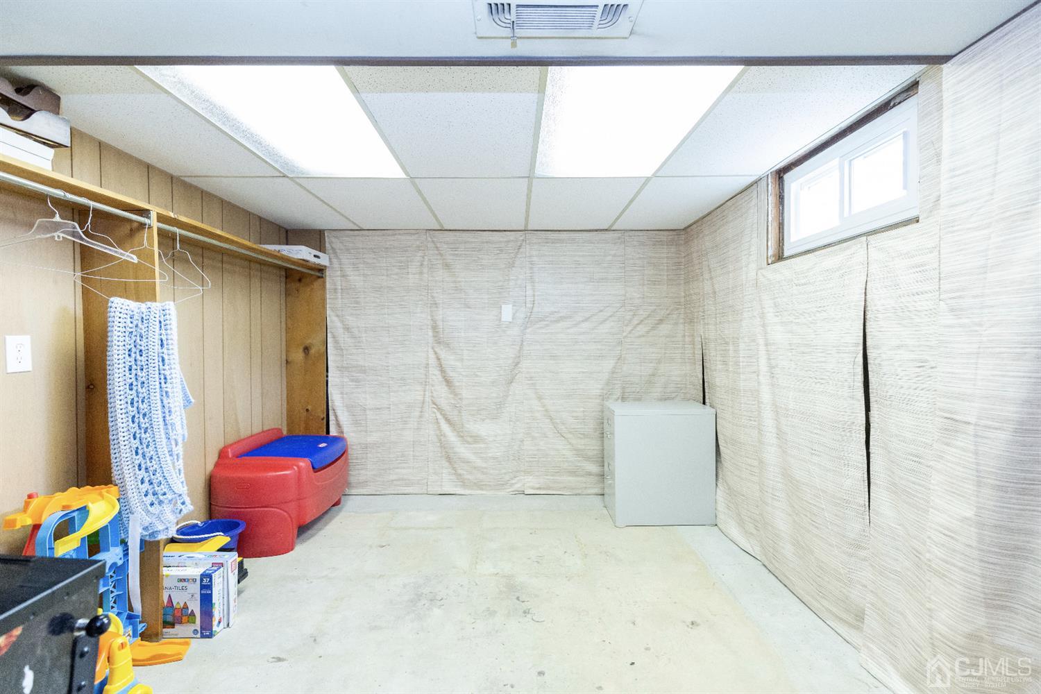 28 Melville Road Edison, NJ 08817 - Photo 29 of 52 a view of storage and utility room with a window