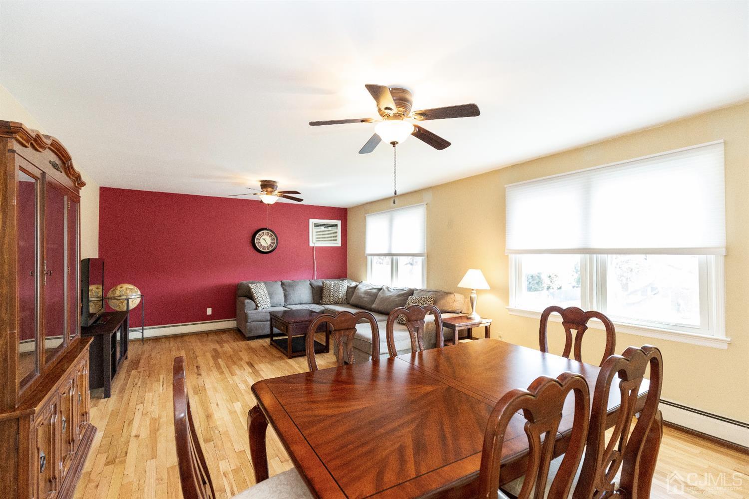 28 Melville Road Edison, NJ 08817 - Photo 31 of 52 a view of a dining room with furniture window and wooden floor