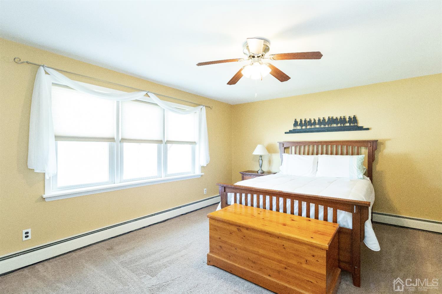 28 Melville Road Edison, NJ 08817 - Photo 37 of 52 a bedroom with a bed and a window