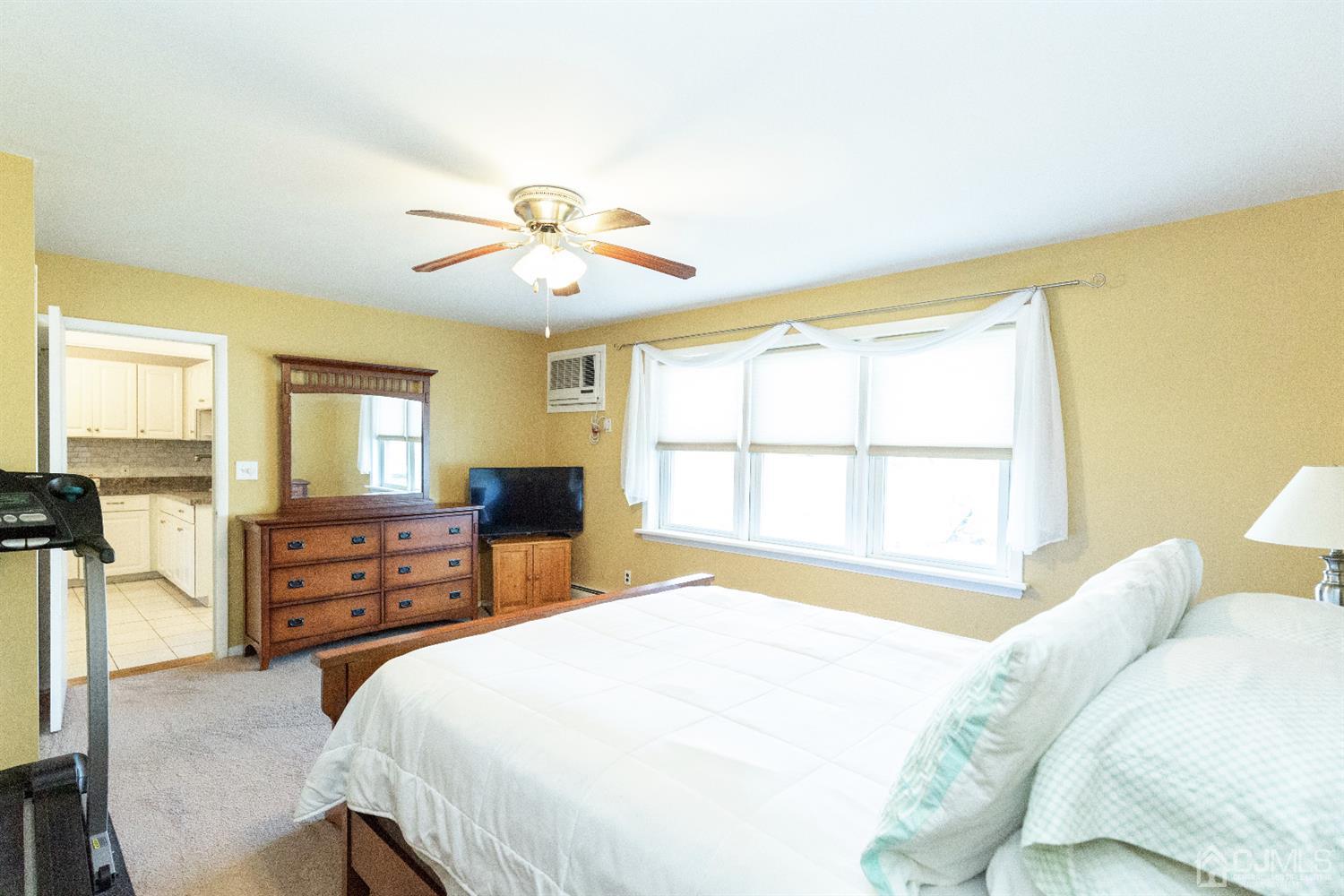 28 Melville Road Edison, NJ 08817 - Photo 40 of 52 a bedroom with a bed and a dresser