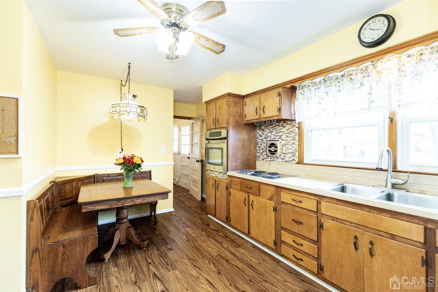28 Melville Road Edison, NJ 08817 - Photo 9 of 52 a kitchen with sink cabinets and window