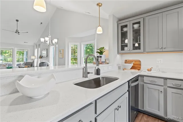 a kitchen with sink and window