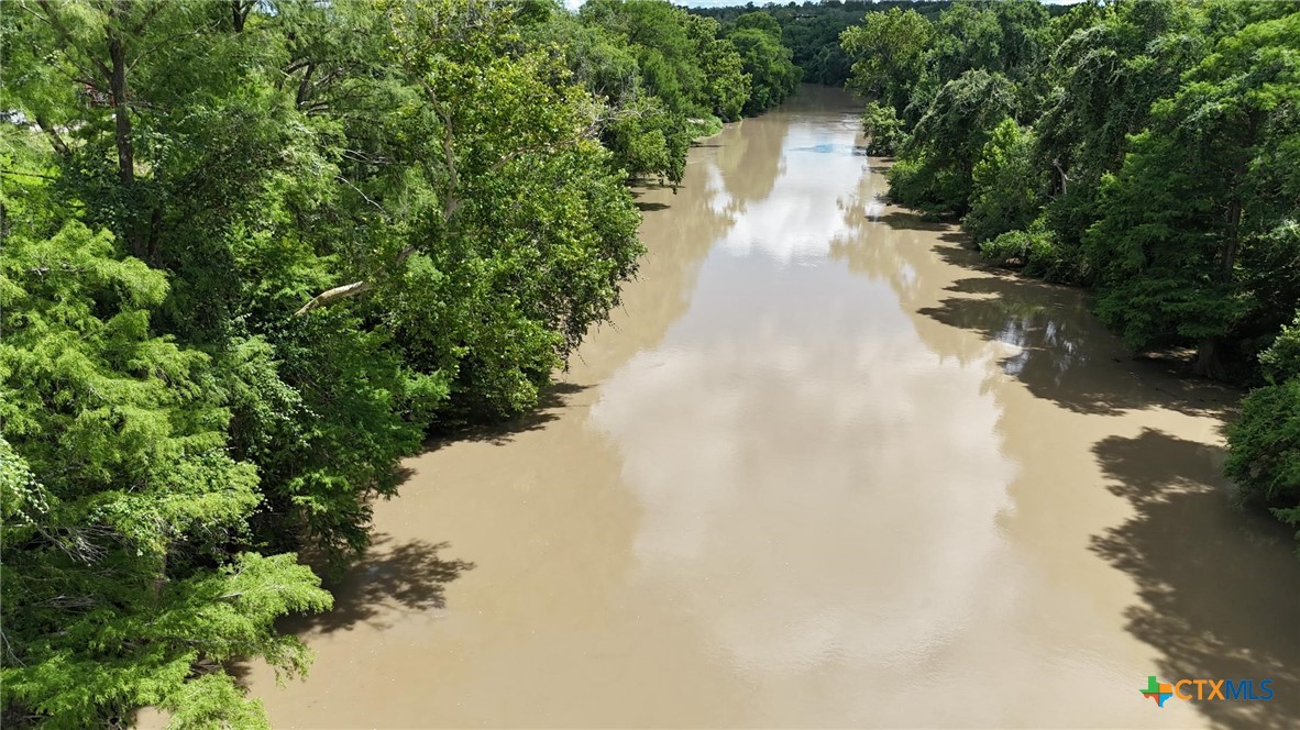 340 Cypress Valley Road Cuero, TX 77954 - Photo 11 of 23 a view of a pathway with a yard