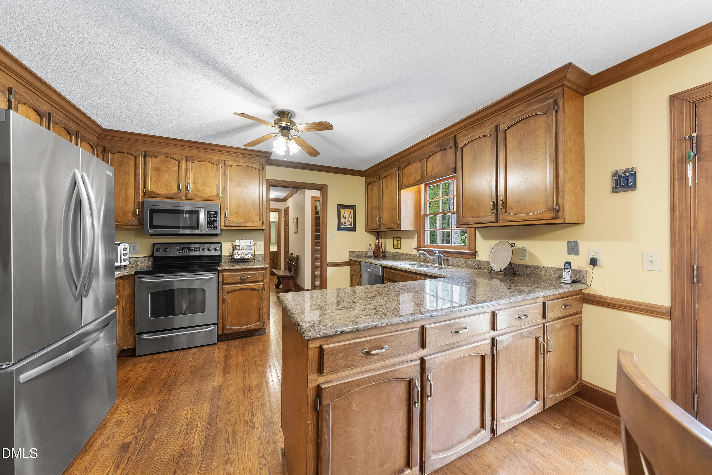717 Misty Isle Place Raleigh, NC 27615 - Photo 10 of 59 Kitchen with Granite Counter tops