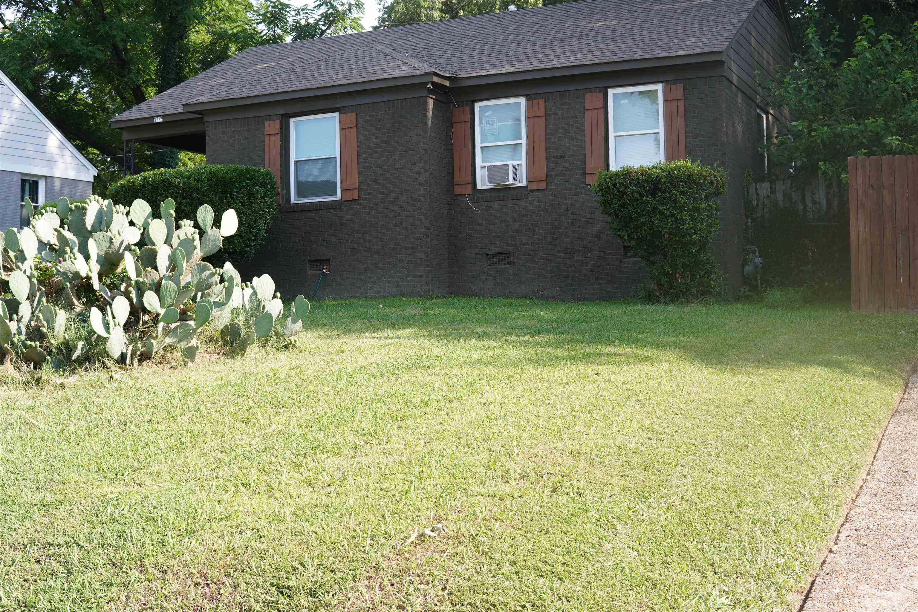 3712 Vanuys Road Memphis, TN 38111 - Photo 1 of 27 a view of a house with a garden