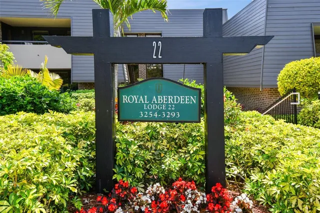 a large kitchen with stainless steel appliances granite countertop a lot of counter space and a sink