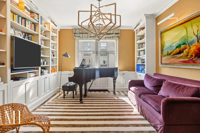 a bedroom with a bed and a cabinets