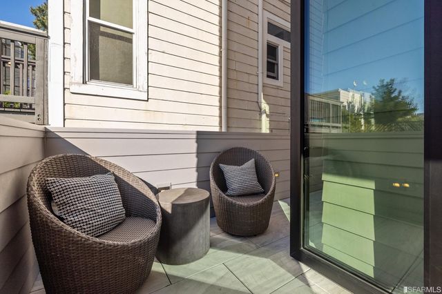 a view of a porch with furniture
