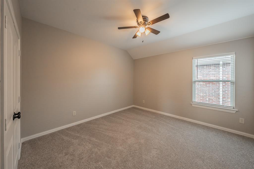 412 Hideaway Road McKinney, TX 75072 - Photo 33 of 40 an empty room with a window