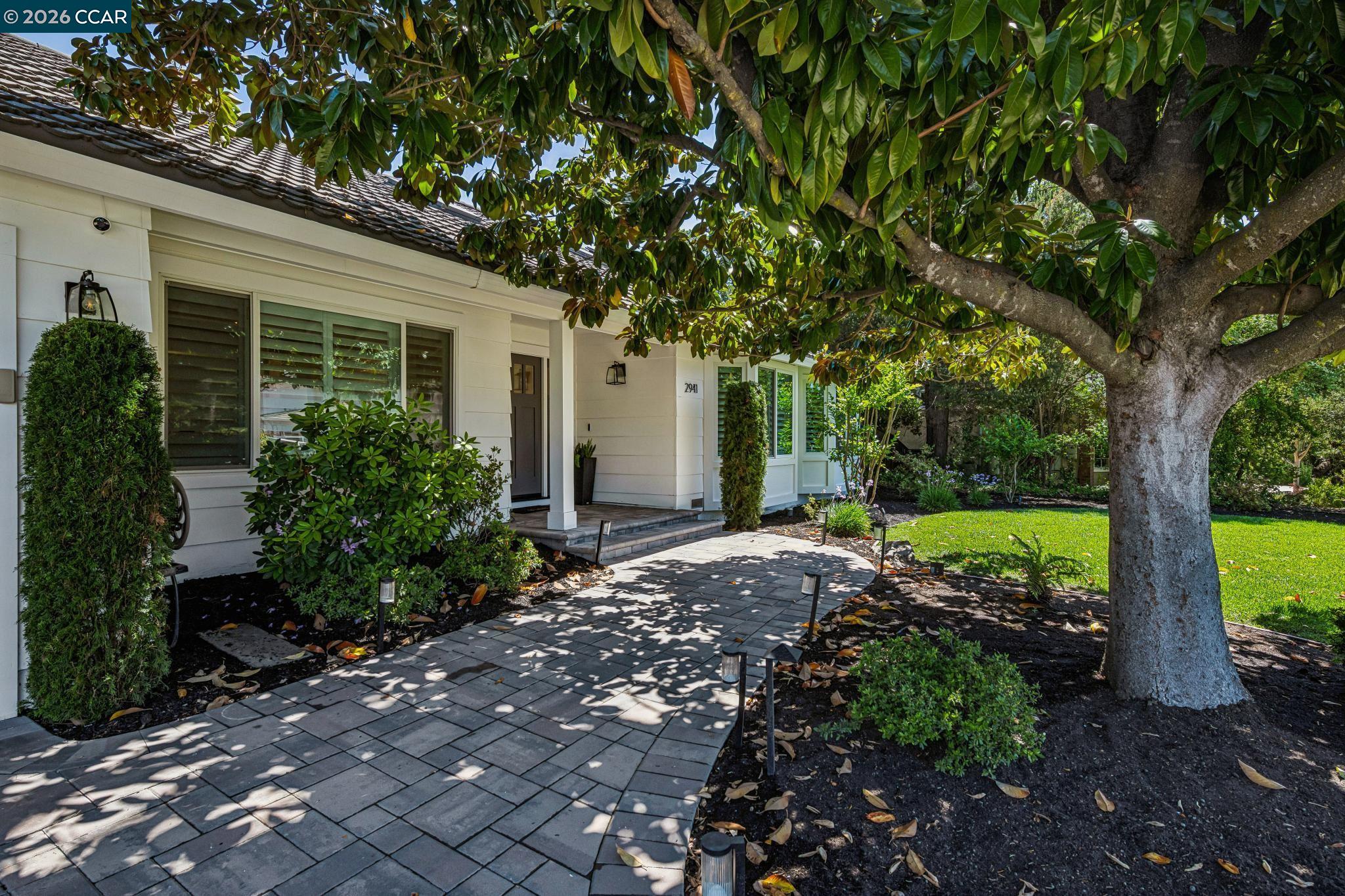 2941 Roundhill Road Alamo, CA 94507 - Photo 4 of 83 a view of a house with backyard sitting area and garden