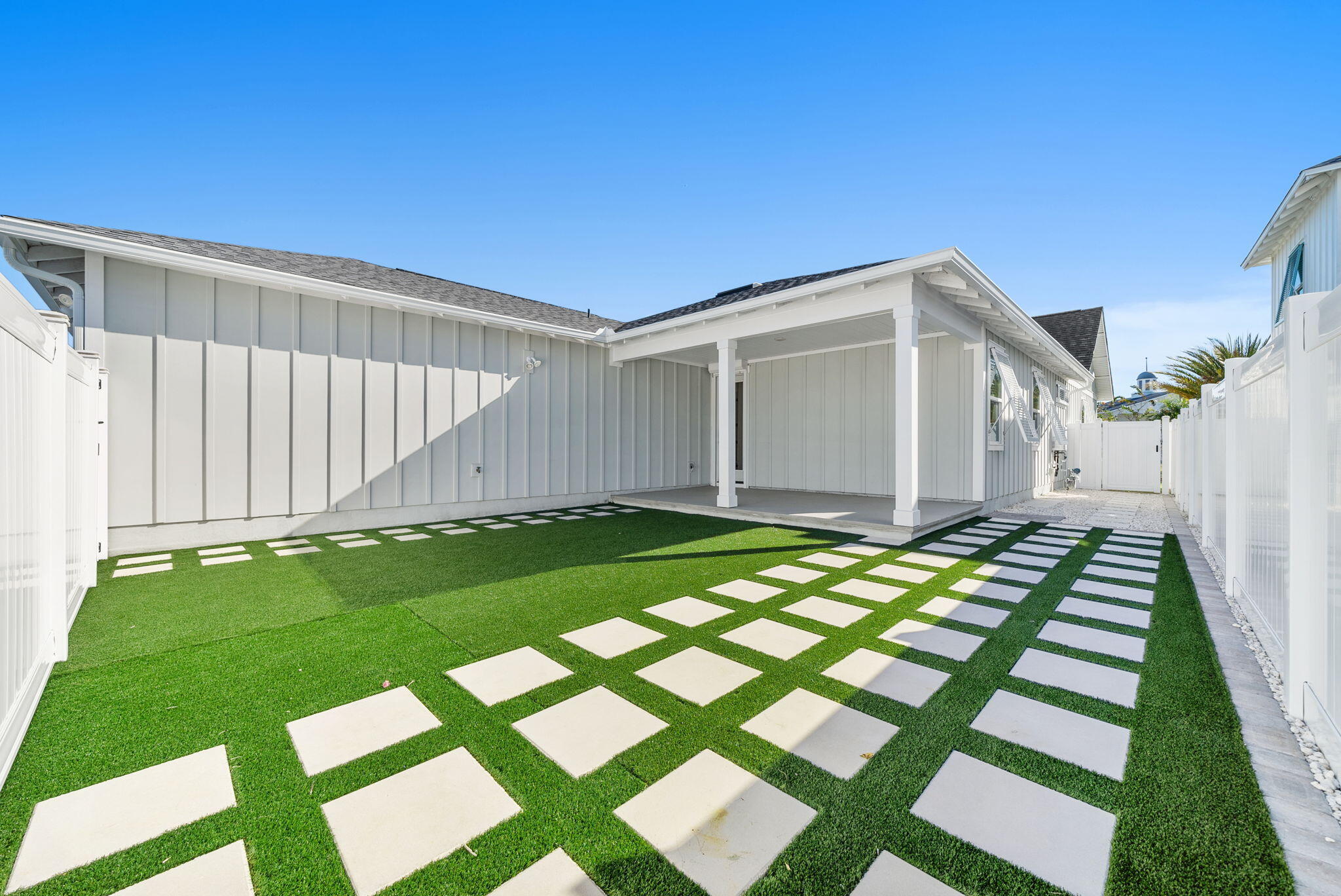 1917 Rushes Avenue Panama City, FL 32405 - Photo 3 of 66 backyard with turf and walking blocks