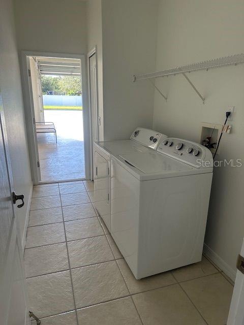 2614 Hartwood Pines Way Clermont, FL 34711 - Photo 22 of 25 a utility room with dryer and washer