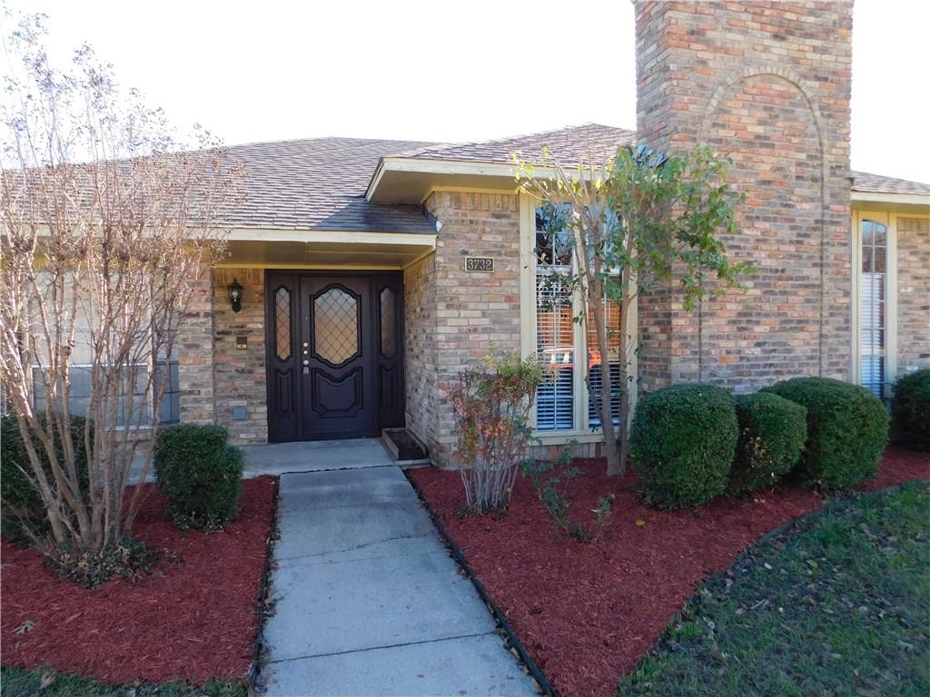 3732 Woodside Road Carrollton, TX 75007 - Photo 1 of 1 a front view of a house with garden