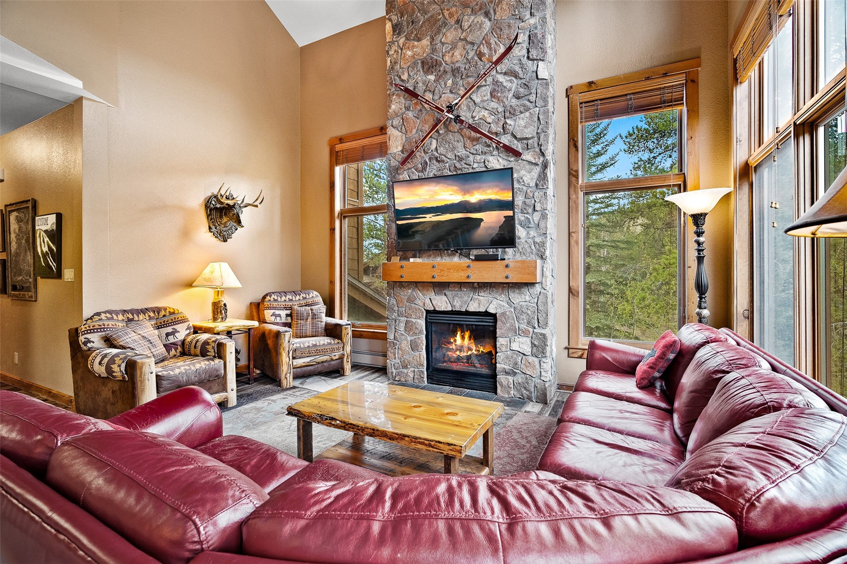 57 Lake Ridge Circle, Unit 1848 Keystone, CO 80435 - Photo 9 of 49 a living room with furniture fireplace and flat screen tv