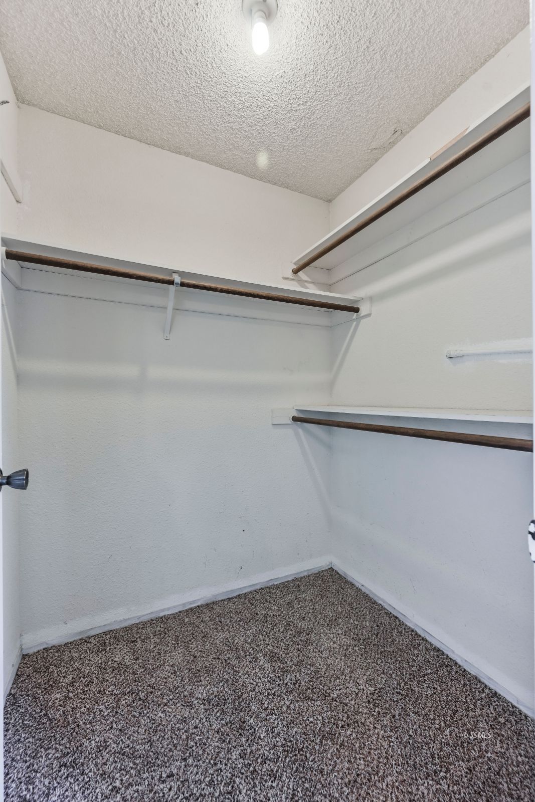 932 West St George Avenue Ridgecrest, CA 93555 - Photo 20 of 28 a view of a room with racks on the wall