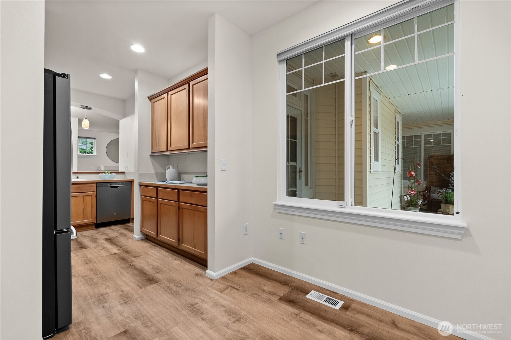 18708 109 Lane Southeast, Unit K30 Renton, WA 98055 - Photo 24 of 36 a view of a kitchen with windows