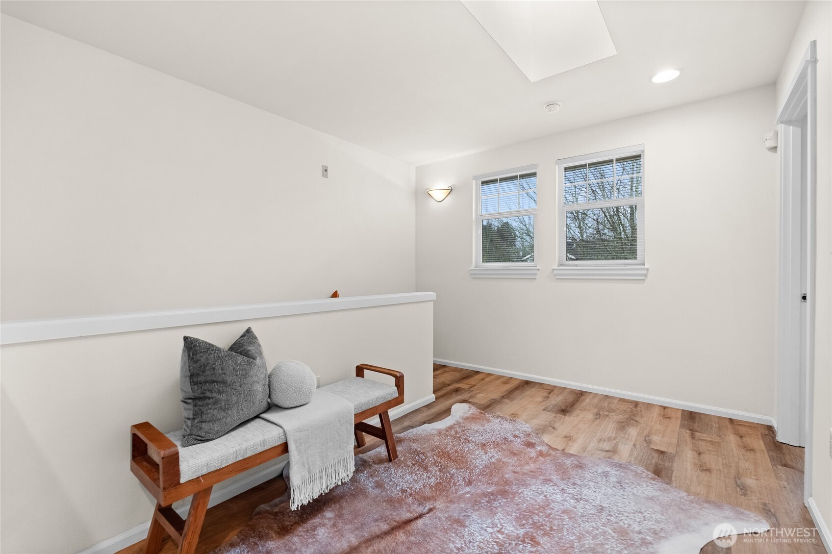 18708 109 Lane Southeast, Unit K30 Renton, WA 98055 - Photo 27 of 36 a living room with furniture and a window