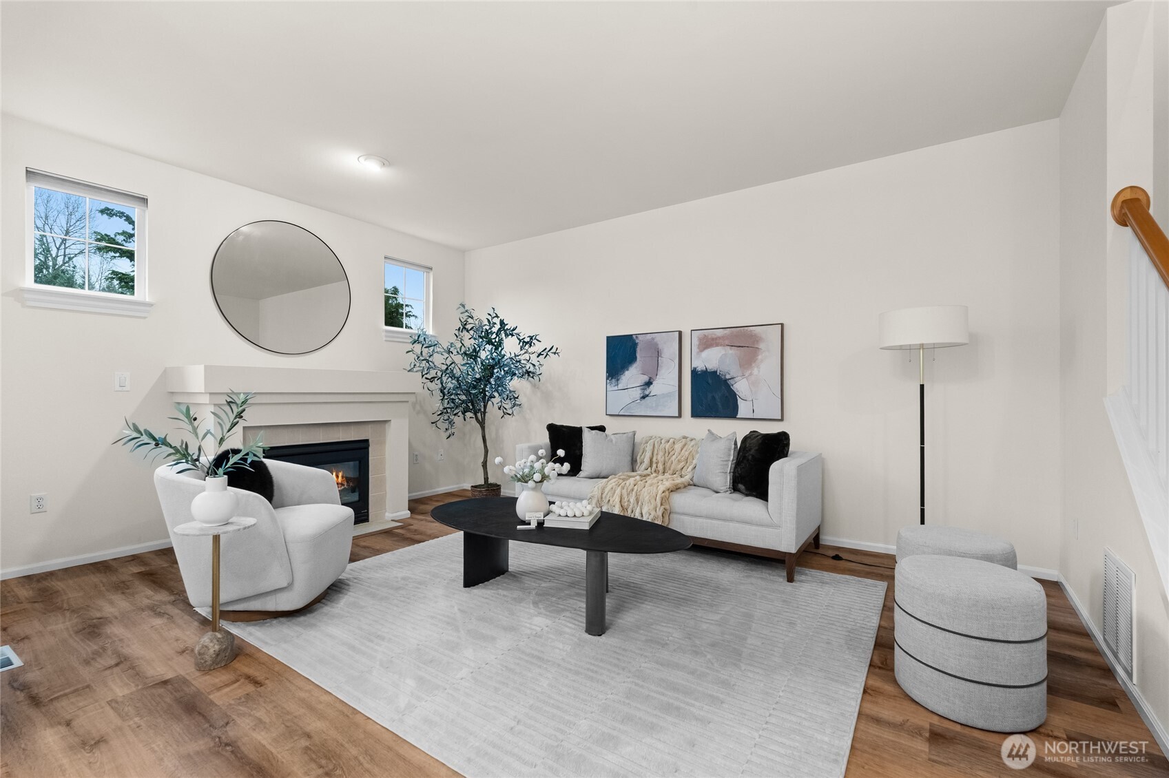 18708 109 Lane Southeast, Unit K30 Renton, WA 98055 - Photo 7 of 36 a living room with furniture a fireplace and a potted plant