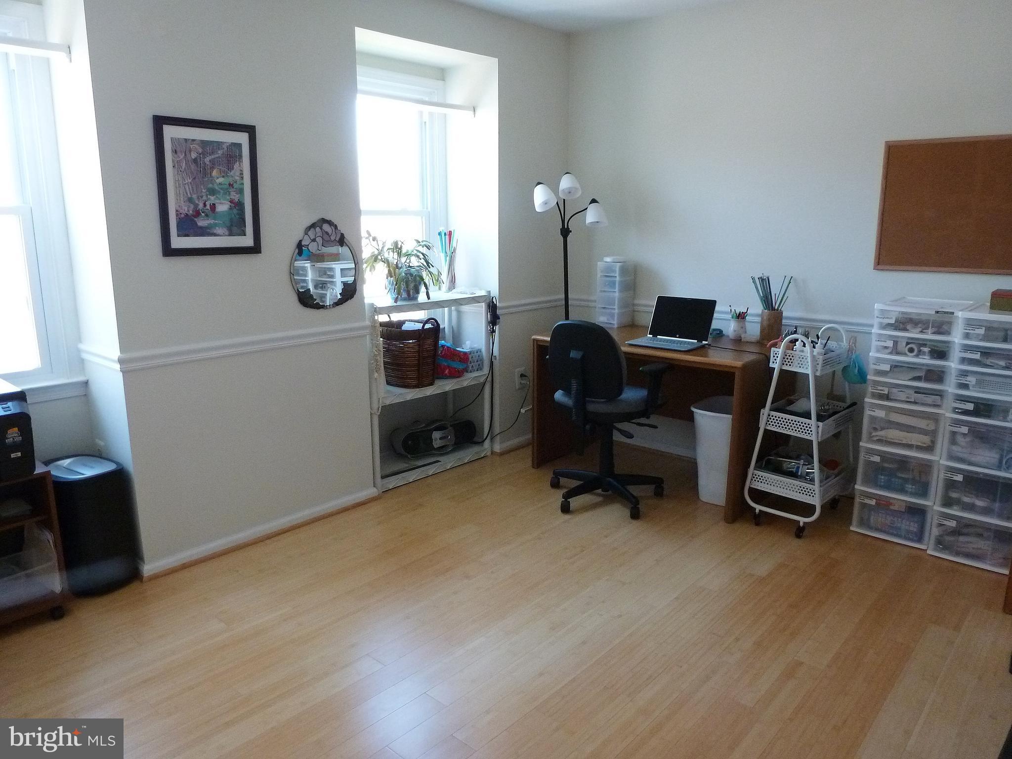 125 Environs Road Sterling, VA 20165 - Photo 19 of 26 Bedroom 3 with wood flooring