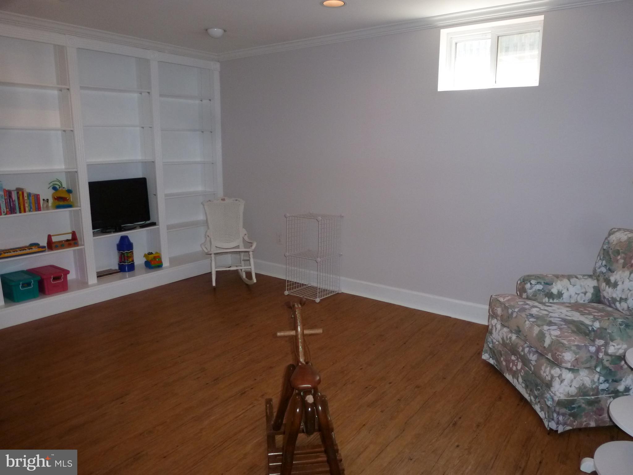125 Environs Road Sterling, VA 20165 - Photo 22 of 26 Recreation Room with built-in shelving