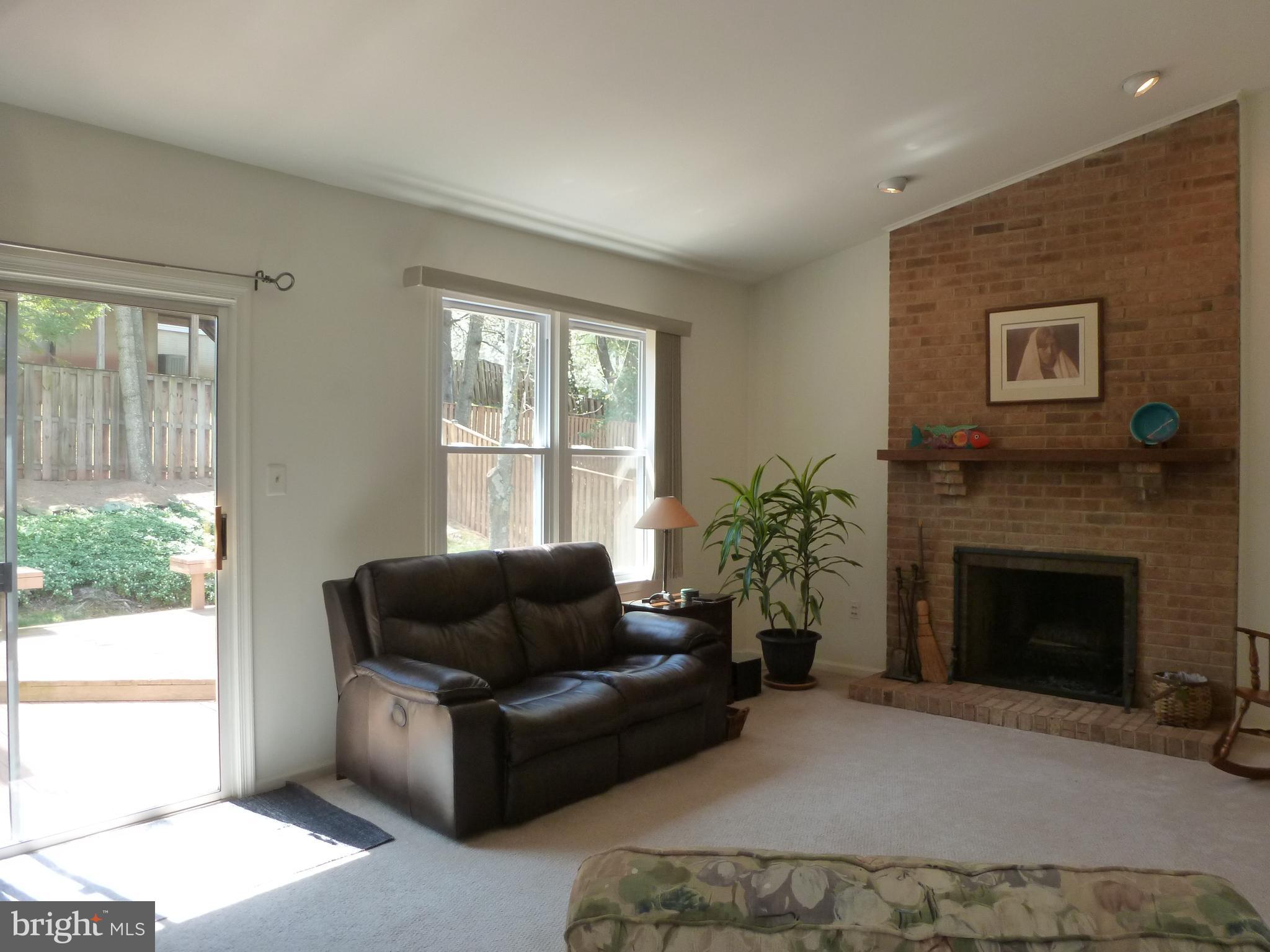 125 Environs Road Sterling, VA 20165 - Photo 6 of 26 Family Room walks out to custom deck
