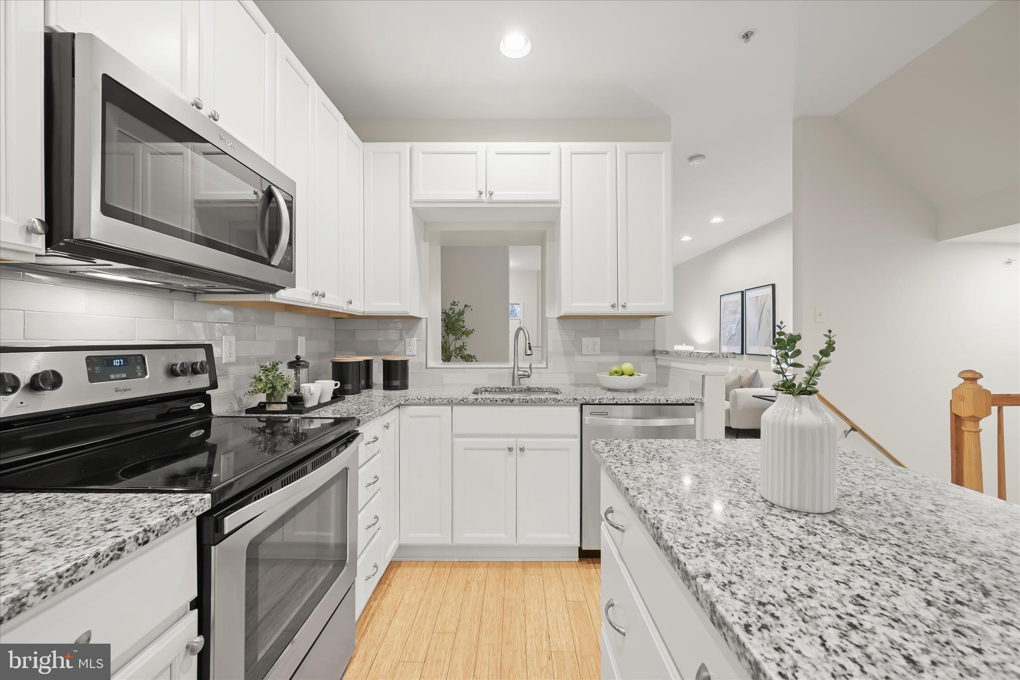 6372 Wind Rider Way Columbia, MD 21045 - Photo 14 of 42 Granite countertops & stainless steel appliances