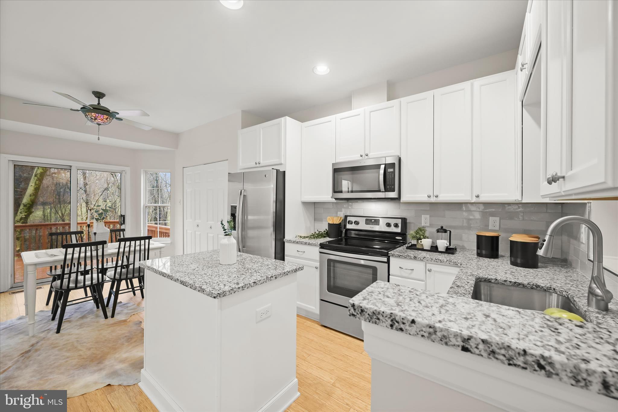 6372 Wind Rider Way Columbia, MD 21045 - Photo 2 of 42 Spacious granite kitchen & dining room