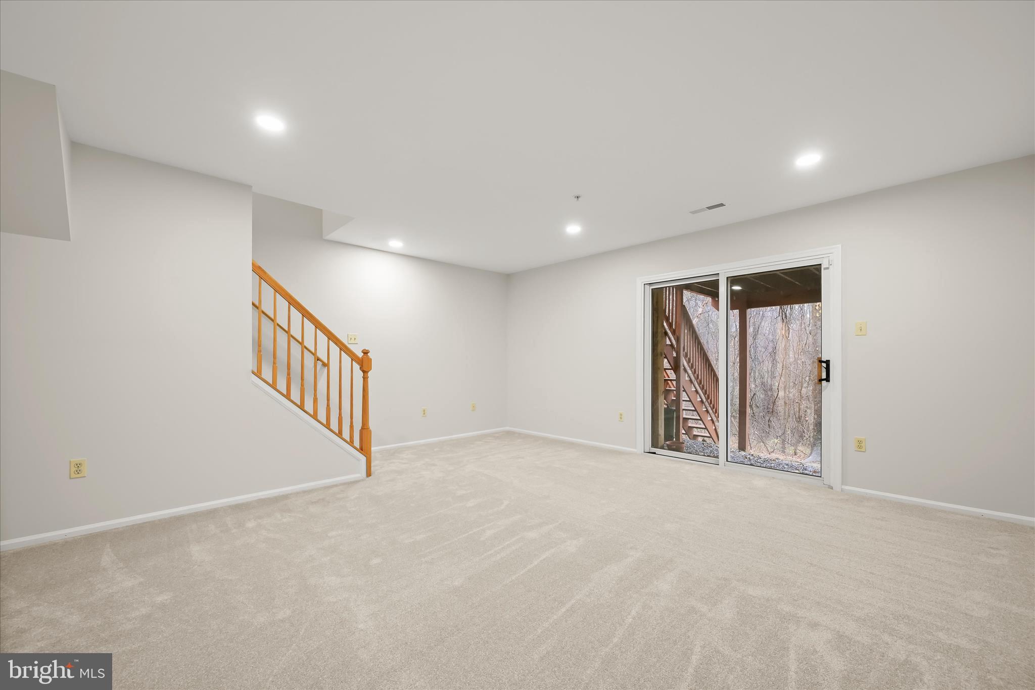 6372 Wind Rider Way Columbia, MD 21045 - Photo 4 of 42 Walkout family room w/ new carpet