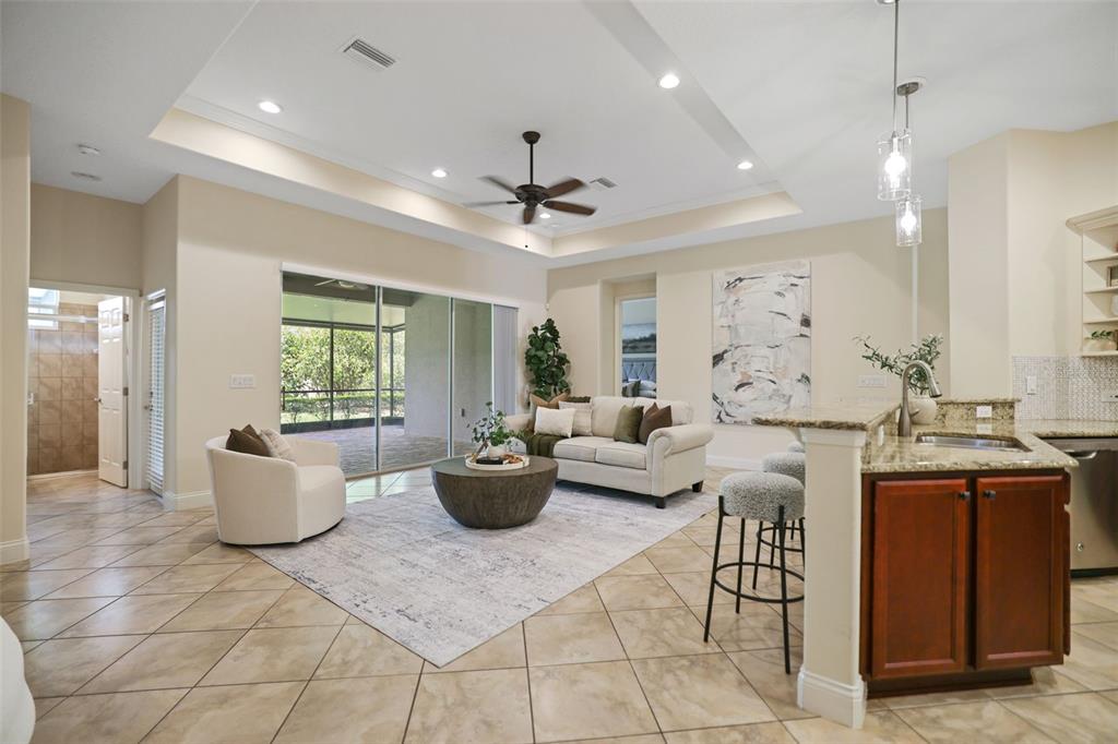 27211 Hawks Nest Circle Wesley Chapel, FL 33544 - Photo 21 of 58 a living room with furniture and a large window