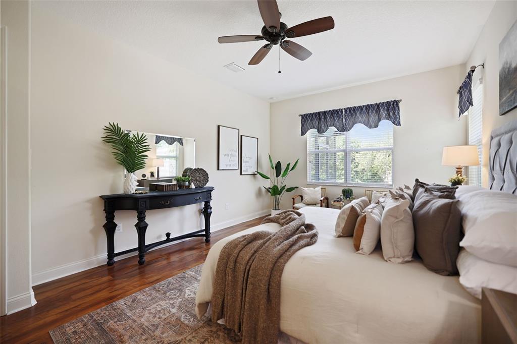 27211 Hawks Nest Circle Wesley Chapel, FL 33544 - Photo 24 of 58 a bedroom with furniture and a window