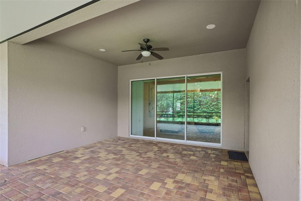 27211 Hawks Nest Circle Wesley Chapel, FL 33544 - Photo 39 of 58 a view of a room with a ceiling fan and a window