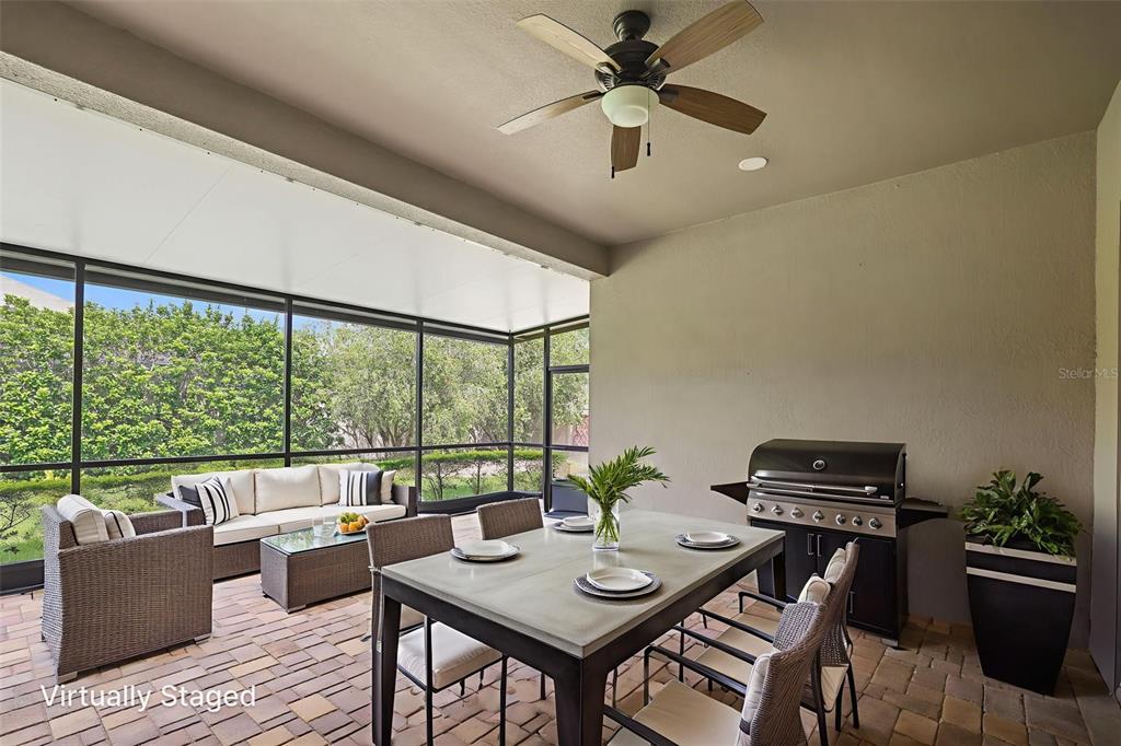27211 Hawks Nest Circle Wesley Chapel, FL 33544 - Photo 41 of 58 a view of a workspace with furniture and a window